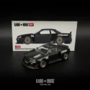 MINI GT 1:64 KHMG222 NISSAN SKYLINE GT-R (R34) KAIDO WORKS GREDDY V2 – BLACK WITH CARBON